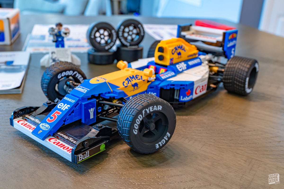 Detailed Lego Williams FW14B model from the Williams Racing team, featuring iconic blue and yellow livery, large tires, and detailed aerodynamic components.