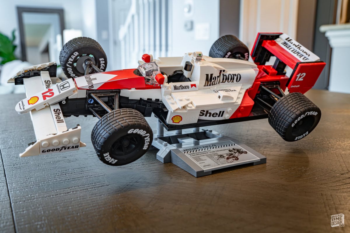 Detailed Lego replica of the McLaren MP4/4 Formula 1 car, showcasing authentic design and sponsor decals. Perfect for racing fans and Lego enthusiasts.