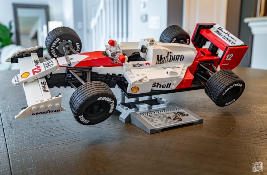 Detailed Lego replica of the McLaren MP4/4 Formula 1 car, showcasing authentic design and sponsor decals. Perfect for racing fans and Lego enthusiasts.
