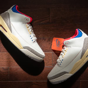 Air Jordan 3 Seoul sneakers with white, grey, red, and blue accents, inspired by Seoul's vibrant culture and style. Perfect for sneaker enthusiasts and collectors.