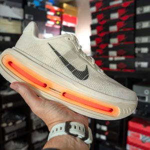 Nike Vomero Premium Sail sneaker with visible air cushioning, lightweight design, and stylish appearance, perfect for running and casual wear.