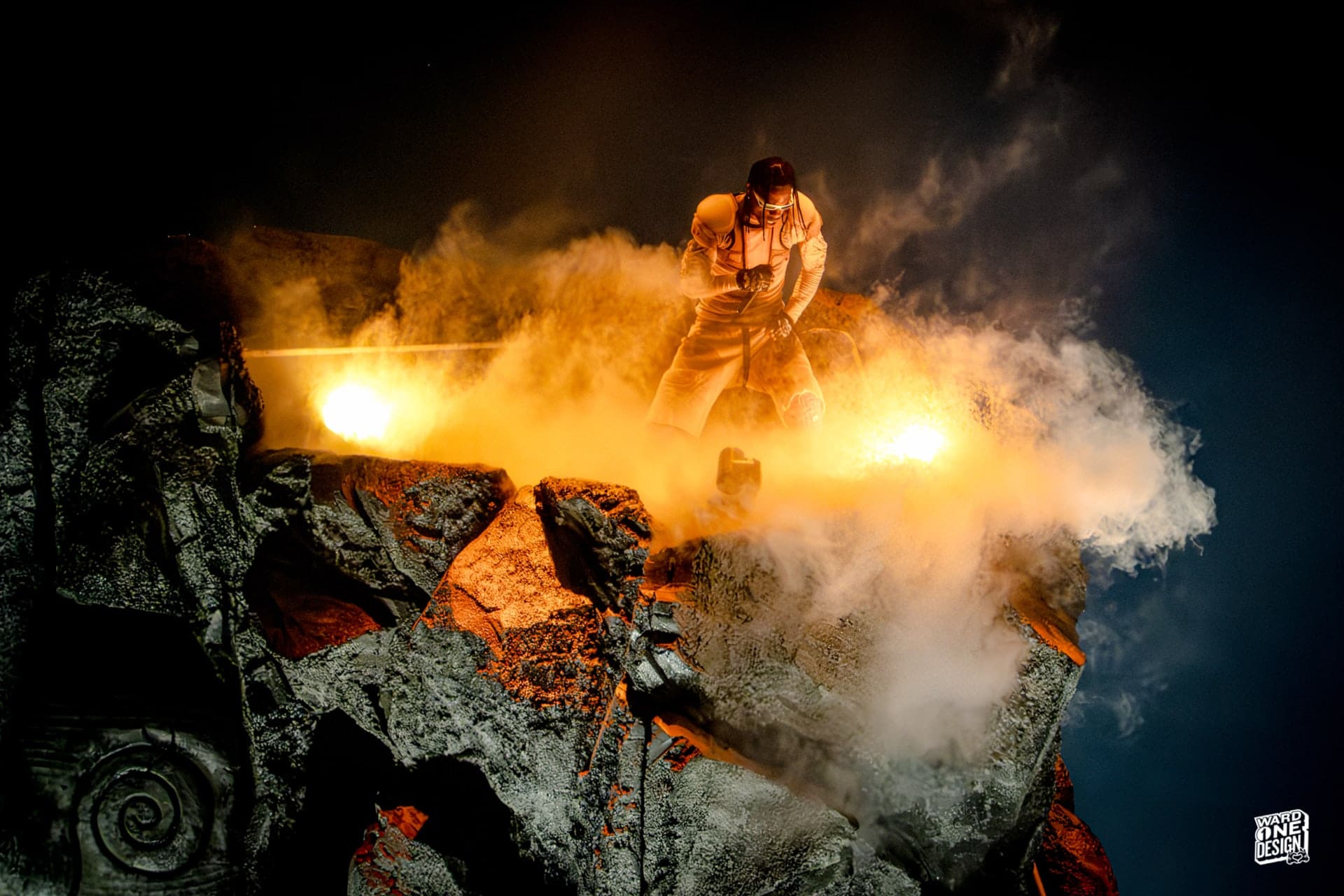 Volcanic Eruption with Lava and Smoke Photograph of a volcanic eruption showing flowing lava, smoke, and ash against a dark sky, capturing the power and intensity of nature's volcanic activity.