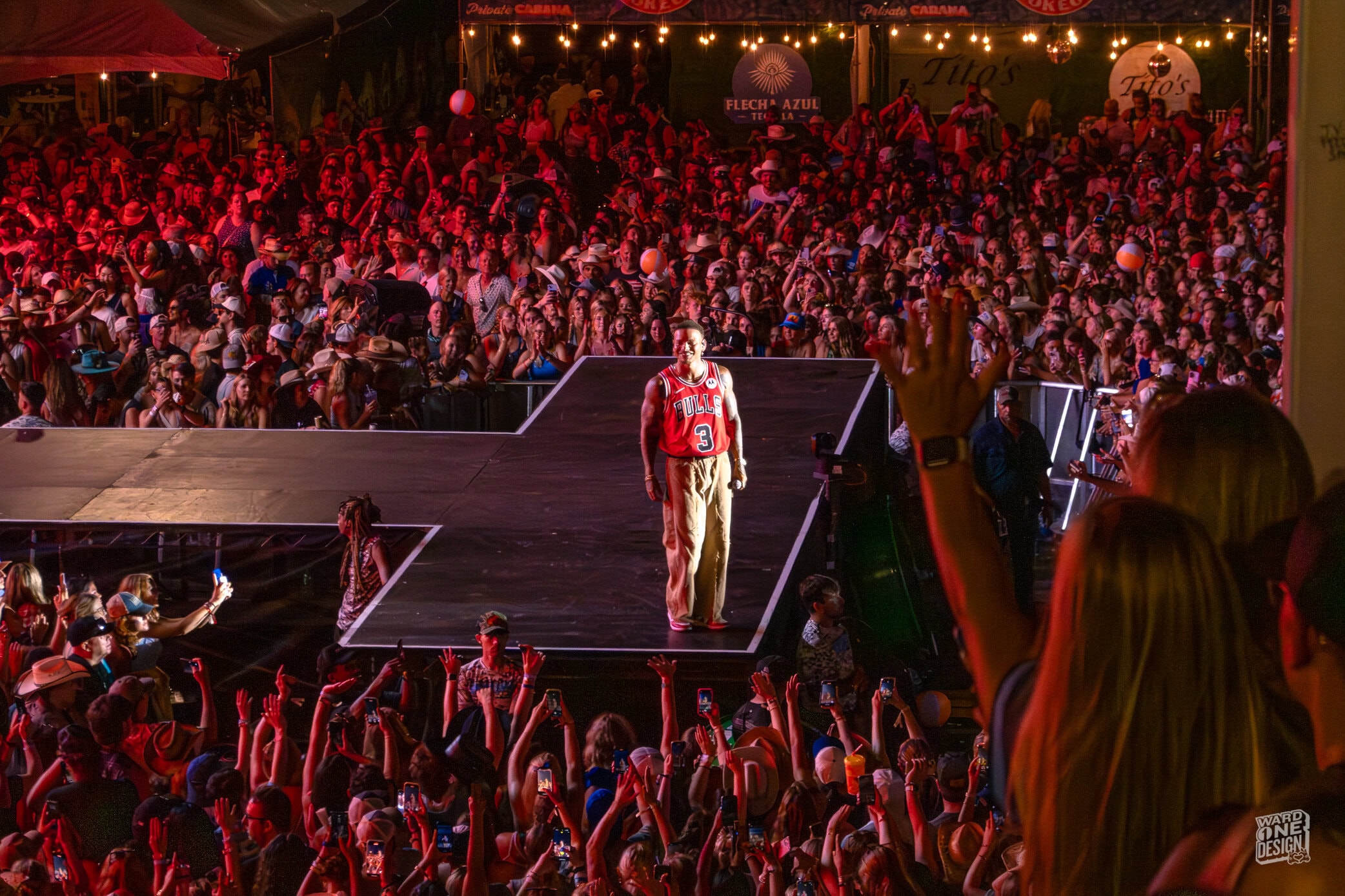 Kane Brown on stage at Windy City Smokeout, engaging the lively crowd with a dynamic performance during the music festival.