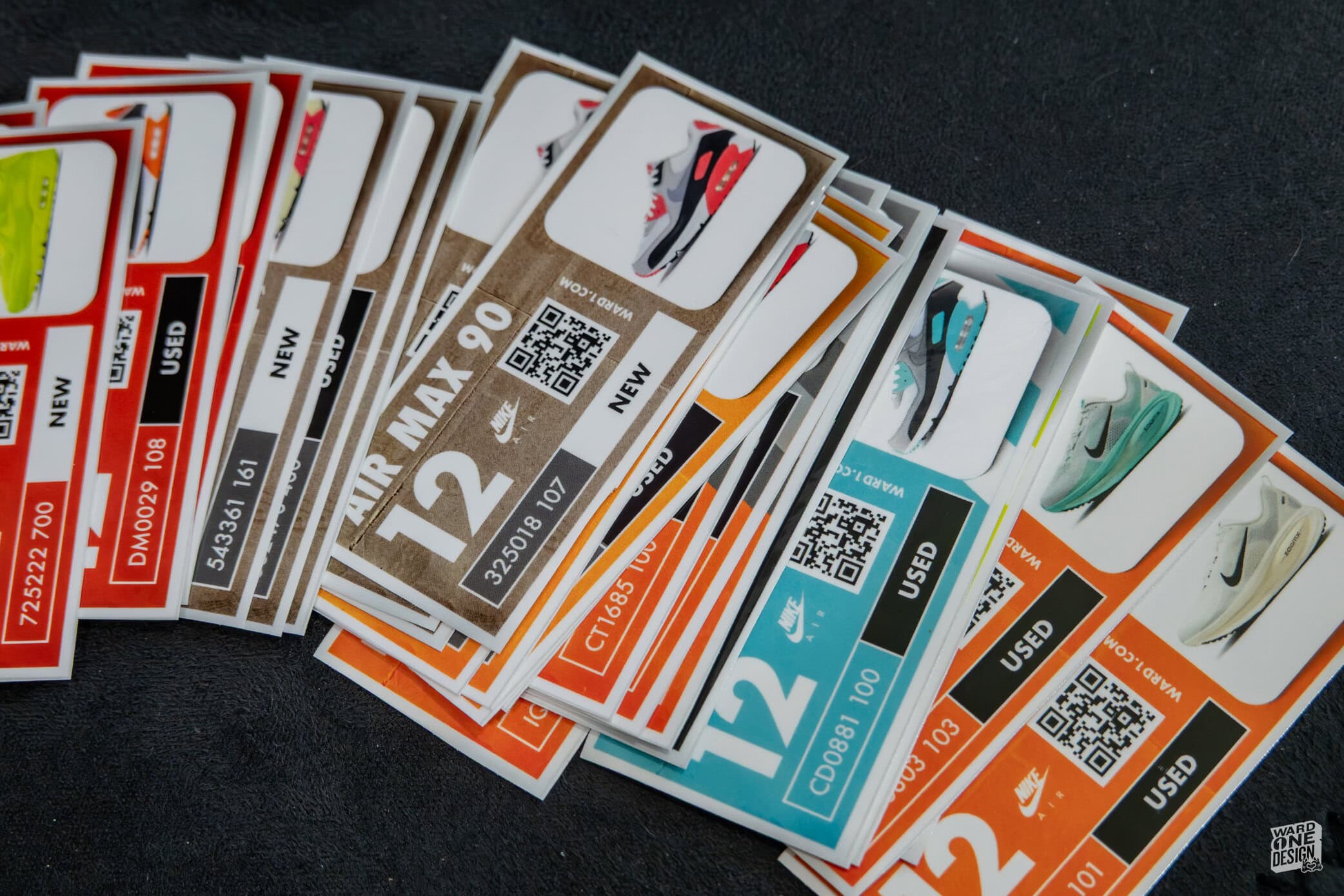 Collection of colorful SneakerBox stickers featuring various sneaker designs and QR codes, ideal for customizing shoes and sneaker enthusiasts.